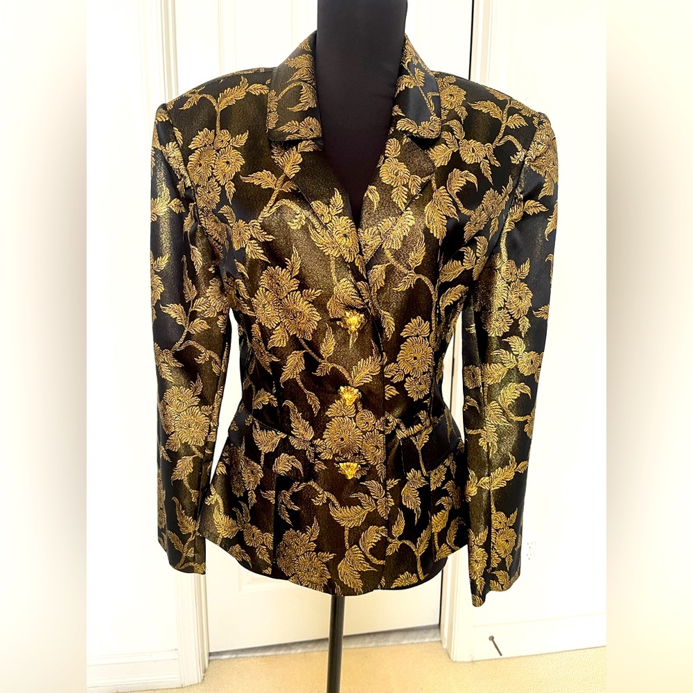 Not available til April

Woman’s black & gold jacket